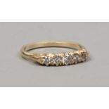 A yellow metal five stone diamond ring, size O.