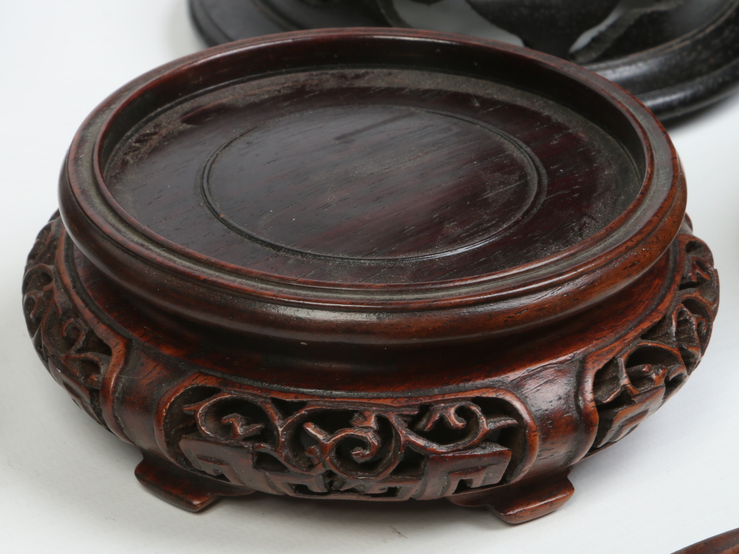 A collection of carved hardwood Japanese and Chinese stands and covers, 19th and 20th century. - Image 5 of 5