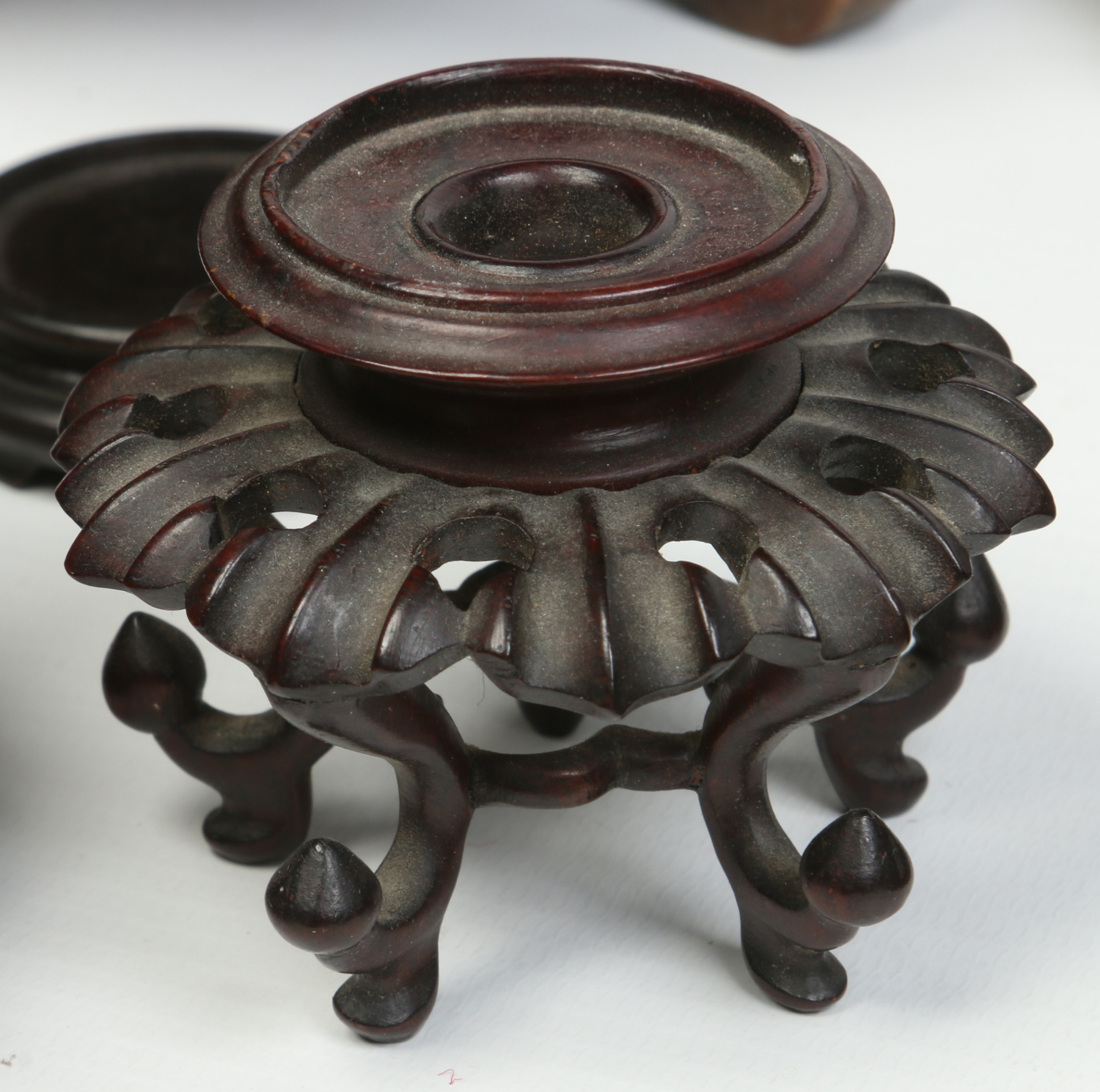 A collection of carved hardwood Japanese and Chinese stands and covers, 19th and 20th century. - Image 2 of 5