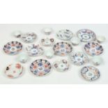 Seven Japanese Imari tea bowls and thirteen saucers c1700. Condition Report.