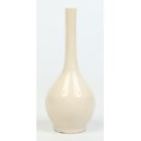 A Chinese cream crackle glazed bottle vase with slender neck, 19cm. Condition Report.