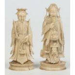 A pair of 19th century Cantonese carved ivory chess pieces, largest 10.5cm.