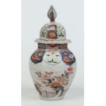 A Japanese Imari octagonal baluster jar and cover.