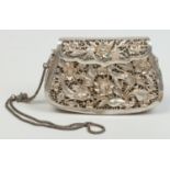 A 20th century Indian silver purse, pierced and decorated with fancy birds and flower heads.