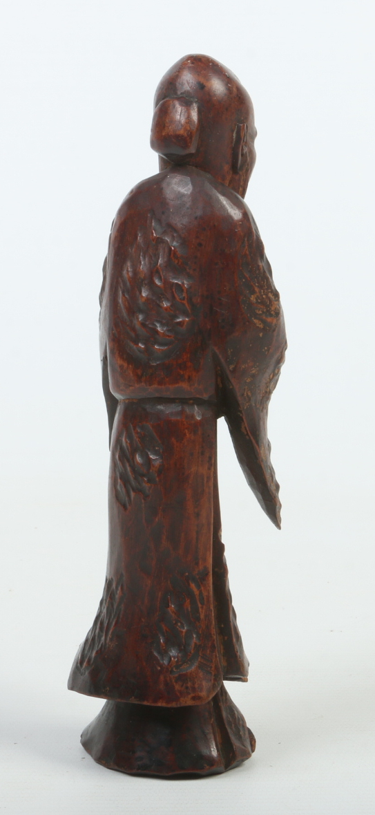 A 19th century Chinese carved and stained wood figure of a sage raised on associated carved - Image 4 of 4