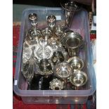 A box of assorted silver plated wares including candlesticks, chamber sticks,