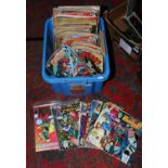 A box of vintage comics including Marvel, DC Superboy, World Illustrated and Atlas examples,