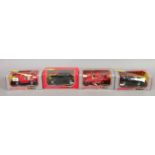 Four boxed Burago 1/24 scale Diecast metal model cars including Lamborghini, Ford,