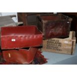 A vintage stencilled wooden crate along with three other examples.