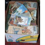 A box of C20th childrens books to include Ladybird and some cloth bound examples.