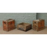 Two vintage wooden Schweppes crates along with a similar Cooked Cornbeef example.