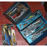 Two steel tool boxes and contents of engineering tools, spanners, saws etc.