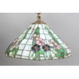 A large Tiffany style floral effect hanging ceiling light.