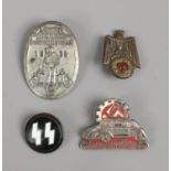 Four German World War II badges; Volkswagen 1938 and SS etc.