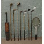 Seven golf clubs with wooden shafts, Dunlop tennis racket and a Don Bradman cricket bat by WM.
