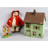 A collection of vintage childrens toys to include dolls house and contents,