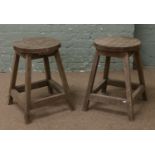 A pair of wooden garden stools.