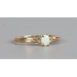 An 18ct gold opal ring, size N.