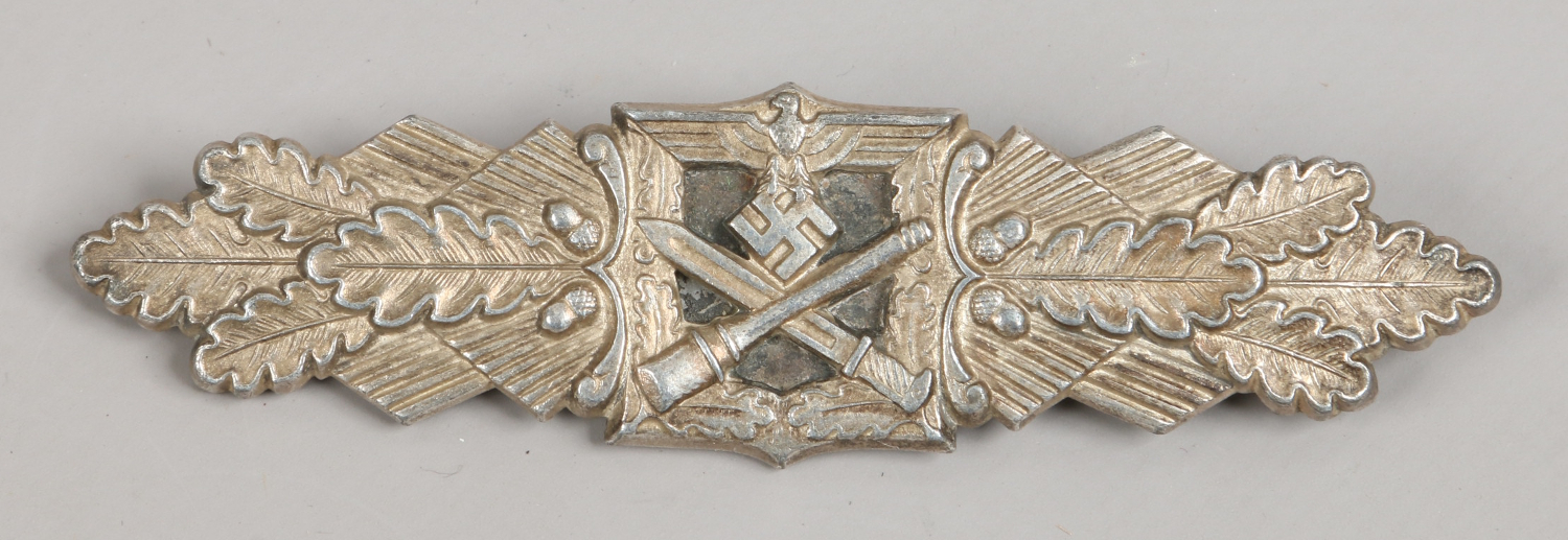 A World War II German Third Reich silver grade close combat clasp, makers mark FB & L.