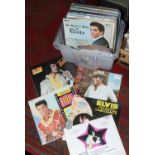 A quantity of Elvis L.P records and various artist 45s.