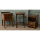 A bedside cabinet with brass mounts Edwardain pot cupboard and a barleytwist occasional table.