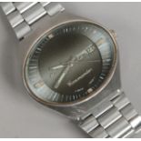 A Hido Commando bracelet wristwatch with oval dial day and date and second sweep finger on two tone