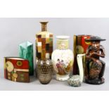 A collection of decorative modern pottery vases and glass along with an African carved wooden