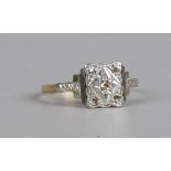 An 18ct gold and platinum Art Deco diamond set ring size L, 2.34 grams.