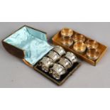 A Victorian boxed set of six silver plated serviette rings,