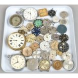 A tray to include wristwatch movements, dials and pocket watches.