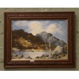 A carved mahogany framed oil on board Tryffan Welsh Mountain monogrammed D.S.T David Thomas.