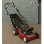 A Honda GV100 petrol lawnmower.