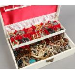A jewellery box containing mixed costume jewellery, some vintage including beads,