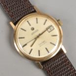 A vintage gents 9ct gold presentation Roamer lime light automatic wristwatch with date display.