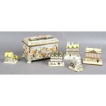 A group of ceramics to include Coalport models of houses,