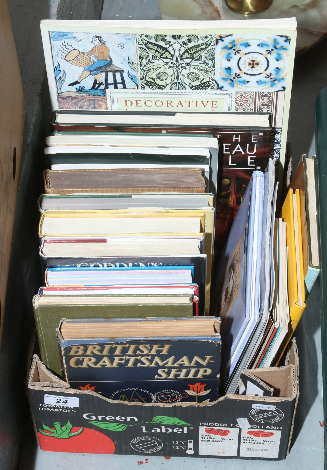 A box of antiques collectors books and guides.