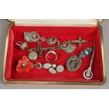 A quantity of costume jewellery including brooches, rings etc.