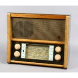 An Eko four wave band valve radio model A239 made in England by E. K. Cole Limited.