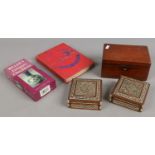 A mahogany tea caddy, two inlaid boxes, along with a stamp album and three Miller check list books.