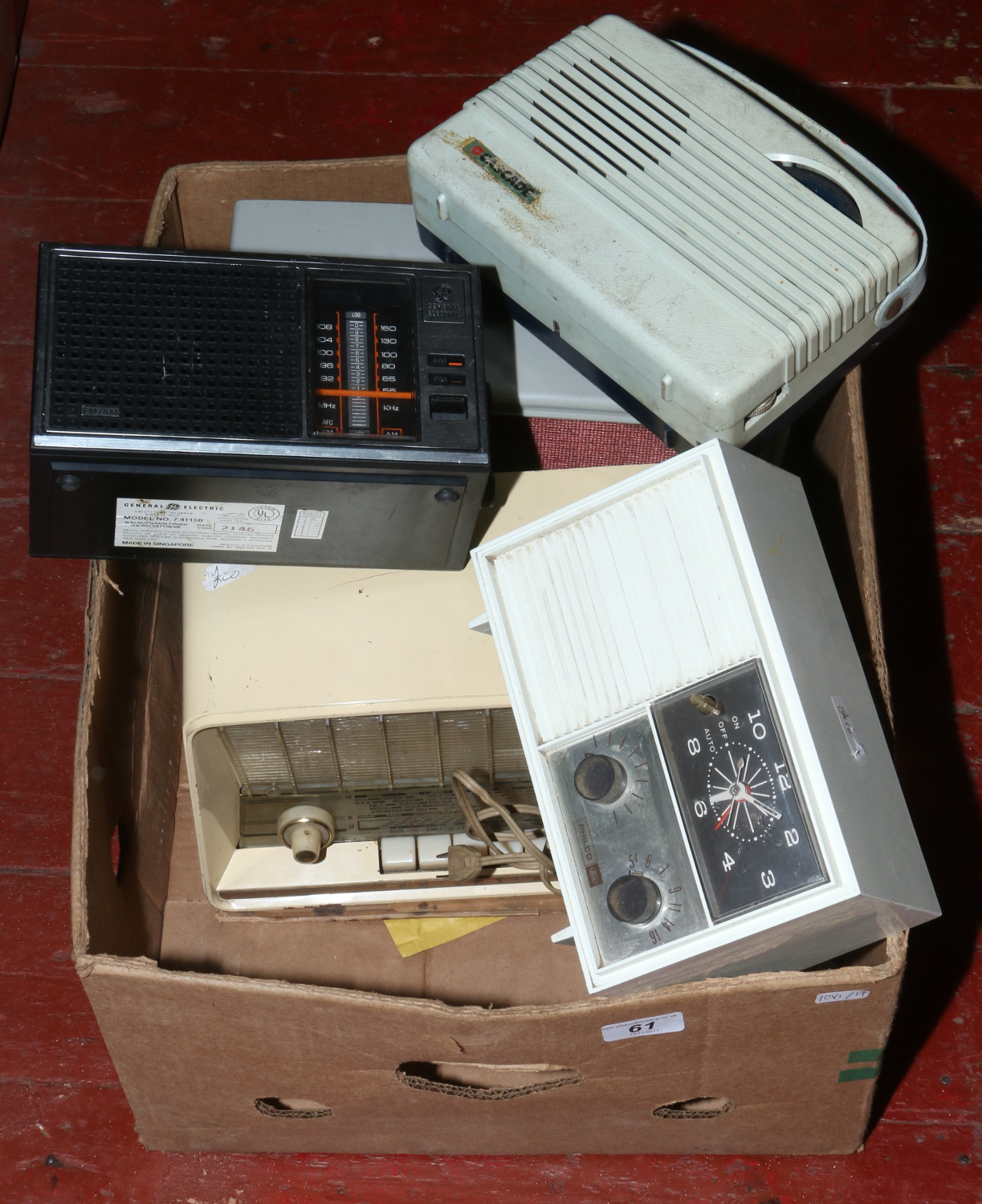 A box of vintage American radios including General Electric, Philco, Cossor etc.