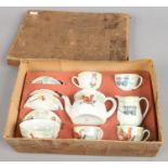 A childs Bavarian bone china tea set in original box.