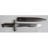 A World War II Spanish M1941 bolo bayonet in metal scabbard.