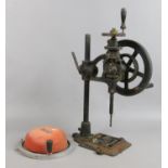 A British made Union pillar drill and a wall mounting fire bell.