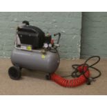 A portable L.W.A 240 volt air compressor.