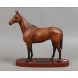 A Beswick connoisseur model Arkle, Champion steeple chaser matt brown on wooden plinth.