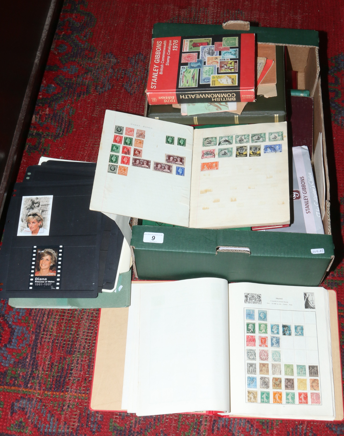 A box of stamp albums Stanley Gibbons catalogues etc.