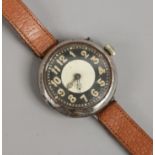 A manual wind chrome plated wristwatch with fixed wire lugs Swiss made military style face.