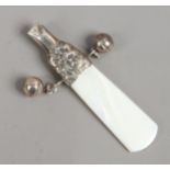 A silver babies rattle with whistle and mother of pearl teething bar.