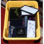 A box of costume jewellery in original boxes to include wristwatches and matching earring and chain