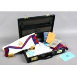A carry case and contents of Masonic items including ephemera, aprons etc.
